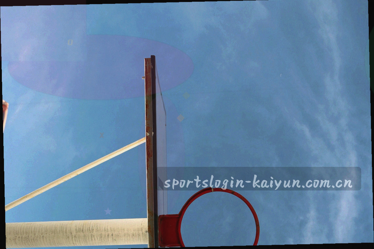 俯拍看台座椅排列与分区通道，各区块颜色区分明显，画面中没有人物
